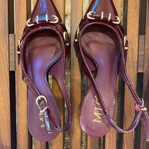 Dark red pointed toe heel